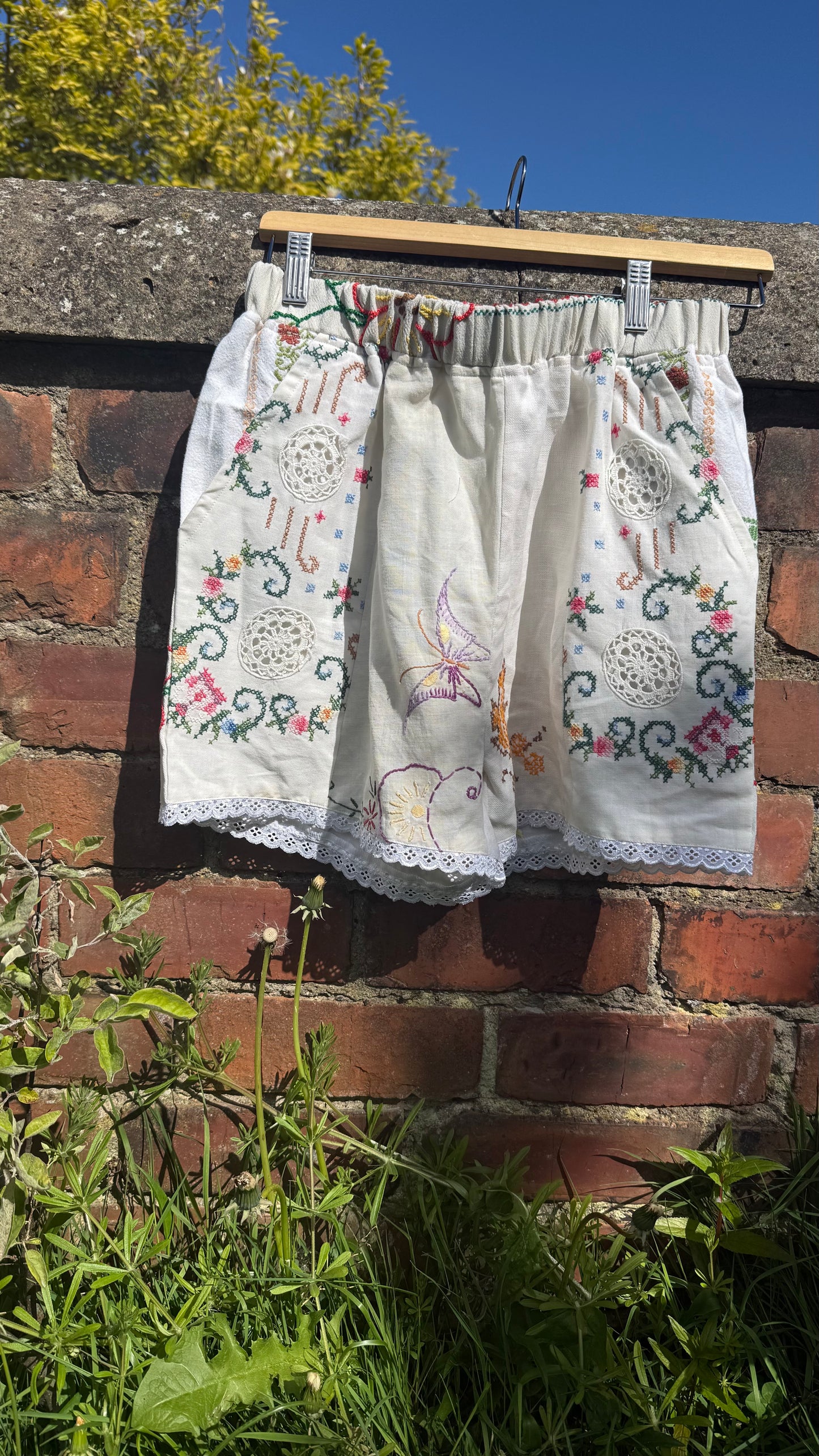 Daisy embroidered shorts