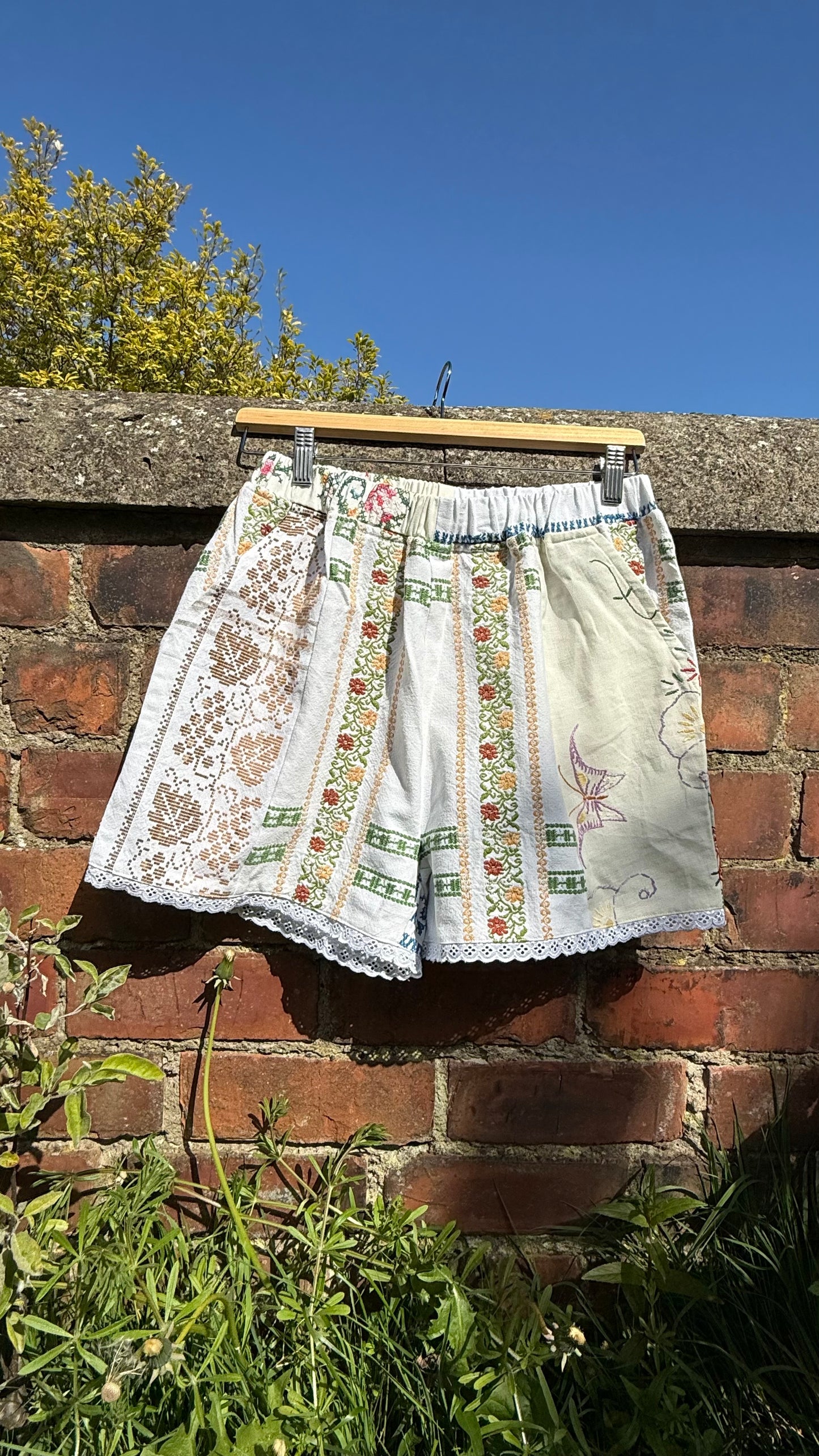 Daisy embroidered shorts