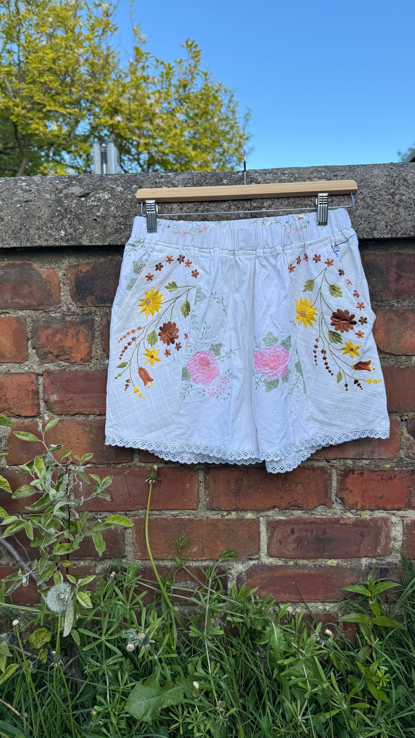 Daisy embroidered shorts