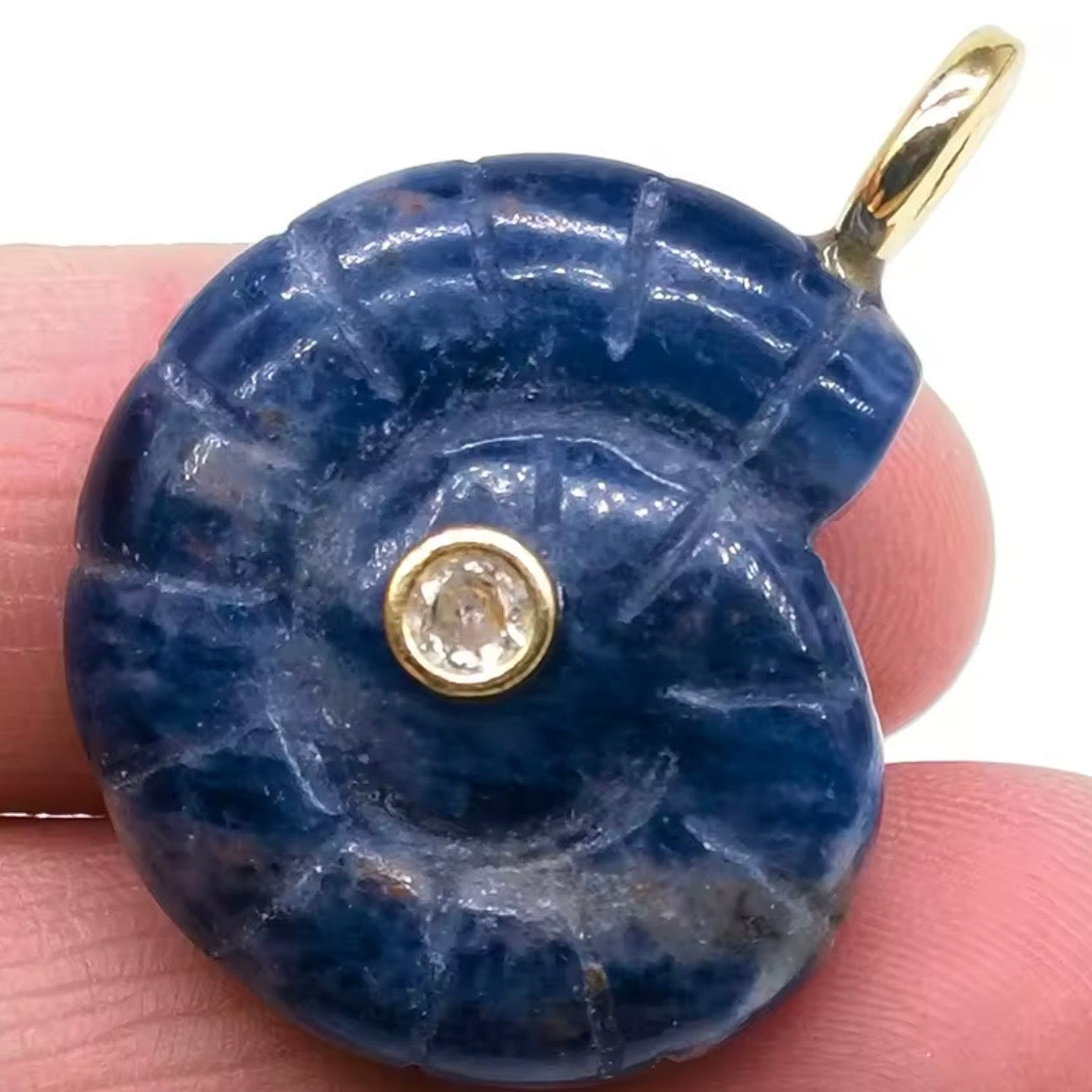 The Conch charm