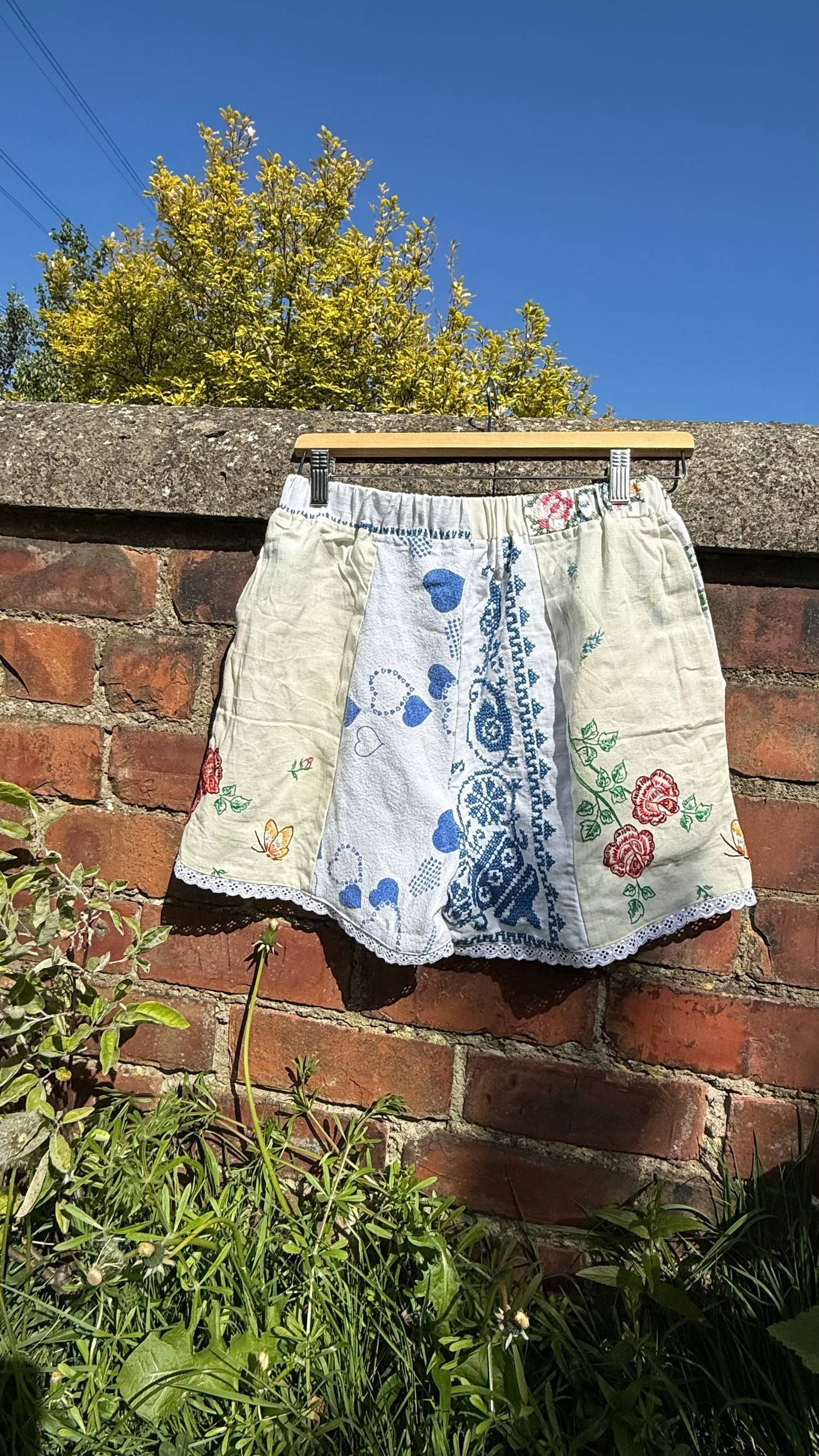 Daisy embroidered shorts