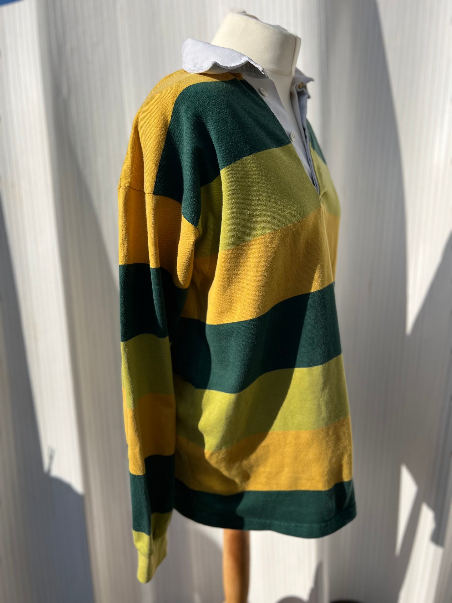 Yellow, green and chartreuse striped rugby shirt