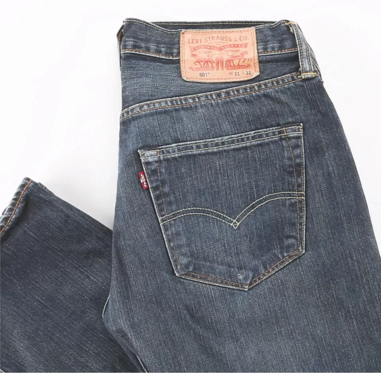 Vintage Levi’s 501’s: Mid blue wash waist 31 Leg 32